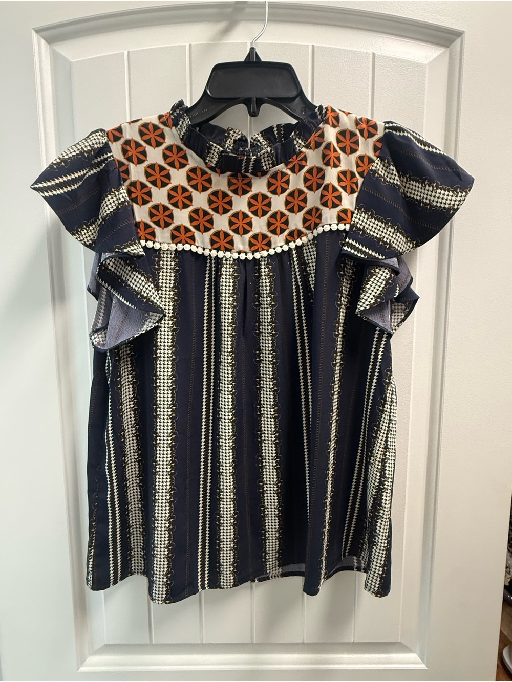 THML Sea Ada  flutter sleeve top featuring a geometric yoke and  stripes NWOT